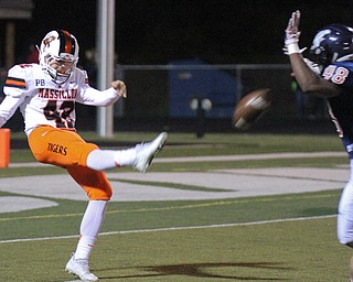 William D. Lewis The Vindicator A punt by Massillon's Magnus Haines(42) is blocked by Fitch's Breylon Douglas during 1rst half action 9-29-17 at Fitch. The Falcons recovered the blocked punt in the endzone and scored.