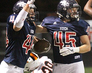 William D. Lewis The Vindicator Fitch's Mike Ferree(44) and Anthony Carino(45) celebrate after Ferree recovered a block Massillon punt to score during 2nd qtr action at Fitch 9-29-17.