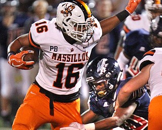 William D. Lewis The VindicatorFitch's Emmanuel Dawkins(10) stops Massillon's Jamir Thomas(16) during 9-29-17 action at Fitch.