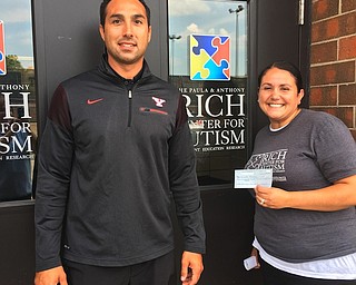 Above, from left are Steve Mientkiewics, an intervention specialist at the Rich Center for Autism and Pam Kassos, also an intervention specialist at the center, who applied for and received a $500 grant from the Autism Society of Mahoning Valley. Both work together in the same high-school classroom and are working to increase the job-skills program. Below, Kylie Luca, a special-education teacher at West Branch Middle School, received a $100 grant from the society.