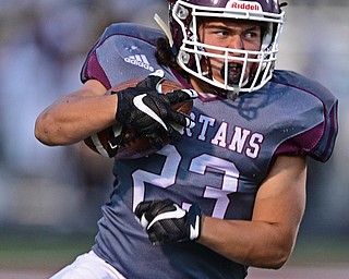Boardman's Kareem Hamdan celebraties after recovering a Canfield fumble during the first half of their game Friday night at Boardman High School. Canfield won 17-7. DAVID DERMER | THE VINDICATOR