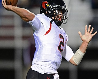 Canfield's Vinny Fiorenza throws a pass during the first half of their game Friday night at Boardman High School. Canfield won 17-7. DAVID DERMER | THE VINDICATOR