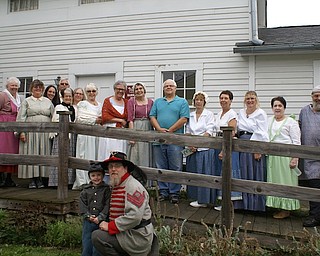 The Girard Historical Society recently sponsored its annual Pioneer Days for fourth-graders in Girard and Liberty. Students learned about life in the past, and the society used the historic Barnhisel House for the lessons. Above, volunteers for the event, standing from left, are : Joyce Faiver, Roberta Lawrentz, Shawn Chuey, John Reddinger, Colette Chuey, Carie Spano, Sally Curl, Ruth Ralston, Carlie O’Neill, Ken Miller, Sandra Reinhart, Rosemarie Parisi, Laura Gramelt, Maryann Creatore and Ray O’Neill. In front, from left, are Frank Young III and Frank Young II.
