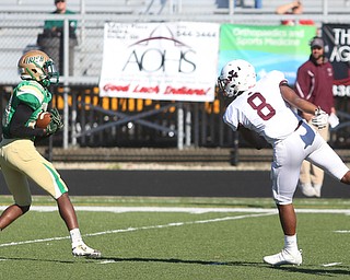 Aquinas strong safety ShaneNoble Jr.(8) tries to intercept the pass as Ursuline wide receiver Duane Leggett(29) catches a 30 yard pass during the third quarter as Aquinas Institue (NY) takes on Ursuline High School, Saturday, Sept. 30, 2017, at Arrowhead Stadium in Girard. Aquinas won 38-26...(Nikos Frazier | The Vindicator)..