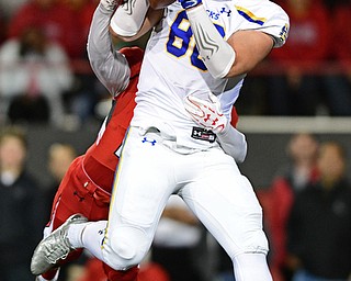 South Dakota State tightend Dallas Goedert(86) catches a pass while being pressured by Youngstown State safety Kyle Hegedus(10) during the first half of their game Saturday, Sept. 30, 2017, at Stambuagh Stadium in Youngstown, Ohio. ..(David Dermer | The Vindicator)..