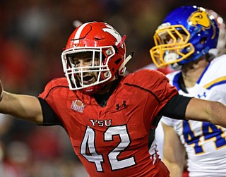 Youngstown State's Armand Dellovade celebrates after intercepting a South Dakota State pass intended for Brady Mengarelli during the second half of their game Saturday at Stambuagh Stadium. Youngstown State won 19-7. DAVID DERMER | THE VINDICATOR