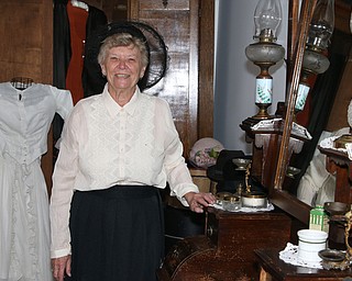 Struthers Historical Society founder Marian Kutlesa poses for a picture in  the master bedroom of the historical society house during the Struthers Historical Society's open house on Saturday afternoon.  Dustin Livesay  |   The Vindicator  9/30/17  Struthers