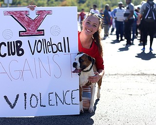 Rebecca Currington and her 4 y/o Boxer Mia pose for a photo during the seventh annual Nonviolence Parade and Rally, Oct. 1, 2017, in downtown Youngstown...(Nikos Frazier | The Vindicator)