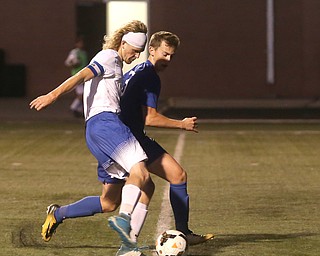 Poland's  Reed McCreery (7) drives towards the goal as Lakeview's  Garrett Dodson (3) defends during the first half as Lakeview High School takes on Poland High School, Tuesday, Oct. 3, 2017, at Dave Pavlansky Field in Poland...(Nikos Frazier | The Vindicator)..