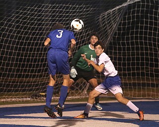 Lakeview's  Garrett Dodson (3) attempts to headbutt the ball into the net past Poland's  Rhys Jones (1) and Poland's  JP Allsopp (9) during the first half as Lakeview High School takes on Poland High School, Tuesday, Oct. 3, 2017, at Dave Pavlansky Field in Poland...(Nikos Frazier | The Vindicator)..