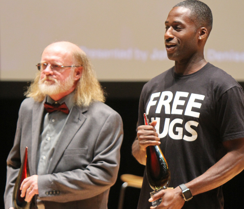 William D. Lewis The Vindicator  2017 Simeon Booker Award for Courage recipients Terry Vicars, left, and Ken Nwadike Jr. during 10-3 event at DeYor Performing Arts Center in Youngstown.