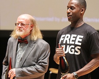 William D. Lewis The Vindicator  2017 Simeon Booker Award for Courage recipients Terry Vicars, left, and Ken Nwadike Jr. during 10-3 event at DeYor Performing Arts Center in Youngstown.