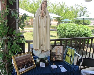 Neighbors | Zack Shively.The statue of Our Lady of Fatima at Beeghly Oaks on Aug. 14 to commemorate the 100 year anniversary of her appearances at Fatima.