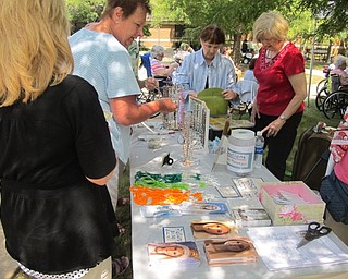 Neighbors | Zack Shively.Beegly Oaks offered rosaries and pictures of Our Lady of Fatima on Aug. 14 as a part of the 100 year anniversary of Our Lady of Fatima's appearances at Fatima.