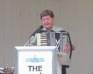 Neighbors | Zack Shively  .Del Sinchak played accordion and sang in Boardman Park on Aug. 17. He has been inducted into Cleveland's Polka Hall of Fame and the Ironworld Polka Hall of Fame in Chisholm, MN.