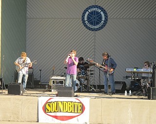 Neighbors | Zack Shively  .Soundbite took the stage in Austintown Township Park for their Concert in Park series on Aug. 22. The band played a set of classic rock covers starting with Van Halen's "Beautiful Girls." Pictured, from left, are Tom Shaffer, Joe Weinel, T.J. Costanza, Tom Davies and Maureen Murray.