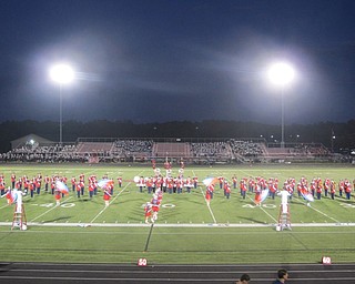 Neighbors | Zack Shively  .Austintown Fitch Marching Band continued their tradition of using a military style in their appearance, marching style and song choice, finishing their show with U.S.'s national march, "The Stars and Stripes Forever."