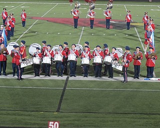 Neighbors | Zack Shively  .The drumline of the Austintown Fitch Marching Band demonstrated their skills with a solo performance.