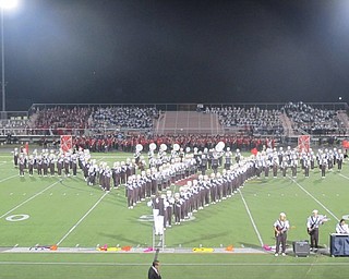 Neighbors | Zack Shively  .The Boardman Spartan Marching Band incorporated instrumentation from outside of the marching style during their presentation at Canfield's Show of Bands, such as an electric guitar, electric bass and a vocal performance. Pictured, the group played Van Halen's version of "You Really Got Me" as the band stood in the form of Van Halen's logo.