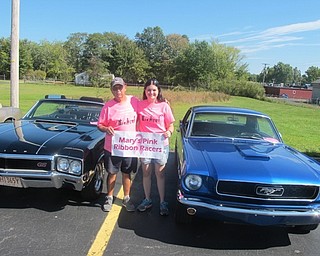 Neighbors | Zack Shively.Rick Kubik and Mandy Comstock organized the Pink Ribbon Car Show on Sept. 23. Their Relay For Life team, Mary's Pink Ribbon Racers, hosted the event.