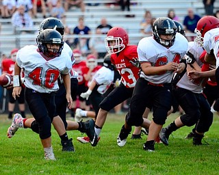 Neighbors | Submitted .Canfield's Augie DeMartino and Caden Kohout led the charge versus Struthers in a recent game. The Cardinal victory over Struthers improved the team's record to 4-0 this season.