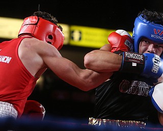 Sylvio Cercone(black) takes on Luca De Chiara(red), Thursday, Oct. 5, 2017, at the Covelli Centre in Youngstown. Cercone won after three rounds by points...(Nikos Frazier | The Vindicator)..
