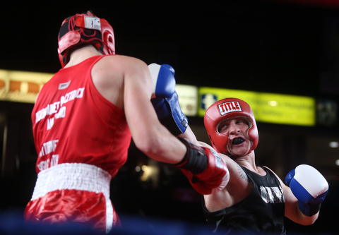 Paul Palombo(black) takes on Daniele Pucciarelli(red), Thursday, Oct. 5, 2017, at the Covelli Centre in Youngstown. Palombo won after three rounds by points...(Nikos Frazier | The Vindicator)..