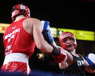 Paul Palombo(black) takes on Daniele Pucciarelli(red), Thursday, Oct. 5, 2017, at the Covelli Centre in Youngstown. Palombo won after three rounds by points...(Nikos Frazier | The Vindicator)..