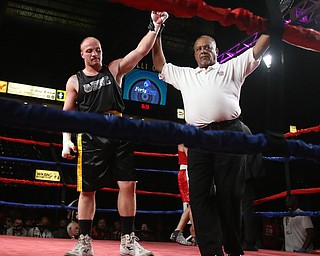 Paul Palombo(black) takes on Daniele Pucciarelli(red), Thursday, Oct. 5, 2017, at the Covelli Centre in Youngstown. Palombo won after three rounds by points...(Nikos Frazier | The Vindicator)..