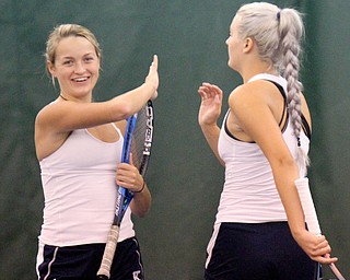 William D Lewis The Vindicator JFK's Kaytlin Marlatt, left, and Lauren Kraker compete in doubles during girls sectionals at Boardman Tennis Center 10-5-17.
