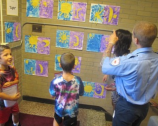 Neighbors | Zack Shively.Students at St. Charles School showed their artwork to the parents on Sept. 26.