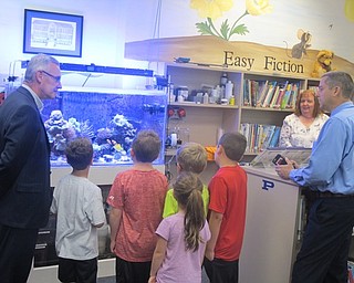Neighbors | Zack Shively.YSU President Jim Tressel met with Union Elementary Principal Michael Masucci in the school's library on Sept. 26 while he visited the school for the Big Dog-Little Dog program, which he called "inspiring."