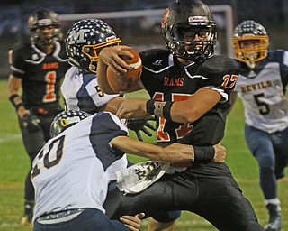             ROBERT  K. YOSAY | THE VINDICATOR..McDonald at Mineral Ridge..Min Ridge #17 Dakota Edwards  is stopped at the line by  McDonald #10 Josh Celli for no gain during first quarter action