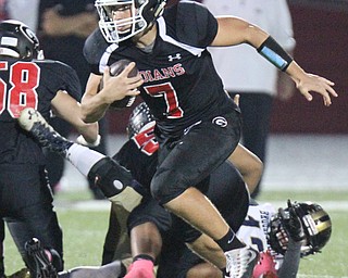 William D. Lewis The VindicatorGirard's Mark Waid(7) scrambles for yardage during 10-6-17 action at Girard.