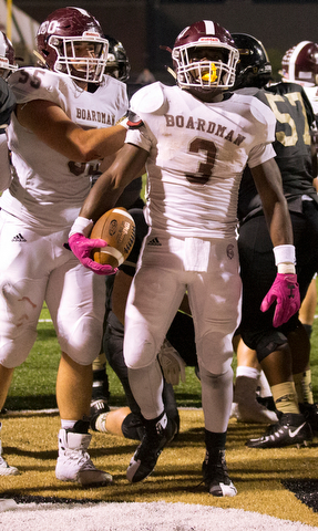 MICHAEL G TAYLOR | THE VINDICATOR- 10-06-17  FOOTBALL Boardman Spartans vs Warren Harding, Harding High School, Mollenkopf Stadium, Warren, OH..1st qtr., Boardman's Domonhic Jennings #3 celebrates his TD run.