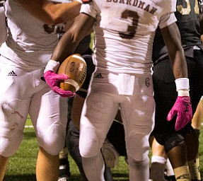 MICHAEL G TAYLOR | THE VINDICATOR- 10-06-17  FOOTBALL Boardman Spartans vs Warren Harding, Harding High School, Mollenkopf Stadium, Warren, OH..1st qtr., Boardman's Domonhic Jennings #3 celebrates his TD run.