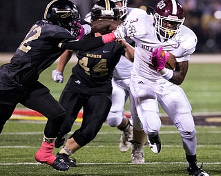 MICHAEL G TAYLOR | THE VINDICATOR- 10-06-17  FOOTBALL Boardman Spartans vs Warren Harding, Harding High School, Mollenkopf Stadium, Warren, OH..1st qtr., Boardman's Domonhic Jennings #3 stiff arms Harding's Tyler Day #32 on his way to a 1st down