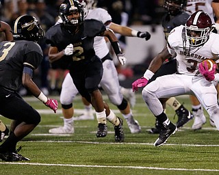 MICHAEL G TAYLOR | THE VINDICATOR- 10-06-17  FOOTBALL Boardman Spartans vs Warren Harding, Harding High School, Mollenkopf Stadium, Warren, OH..2nd qtr., during a 20 yard plus run, Boardman's Domonhic Jennings #3 puts a move on Harding's Jeremy Wilson #3