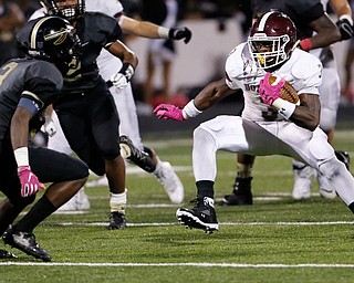 MICHAEL G TAYLOR | THE VINDICATOR- 10-06-17  FOOTBALL Boardman Spartans vs Warren Harding, Harding High School, Mollenkopf Stadium, Warren, OH..2nd qtr., during a 20 yard plus run, Boardman's Domonhic Jennings #3 puts a move on Harding's Jeremy Wilson #3