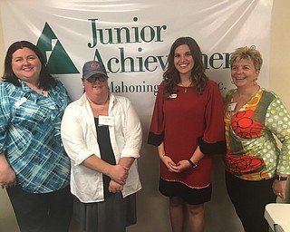 Above, Junior League of Youngstown board members for 2017-18 are, from left, Elizabeth Kijowski, treasurer; Heather Elder, nominating chairwoman; Paige Rassega, president; Kathryn Scheel, sustainer representative to the board. Missing from the photo are, Sara Wenger, secretary, and Suzanne Fleming, sustainer representative to the board.