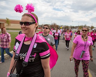 Stephanie Rhodes of Cortland, walks with pink pride in support for breast cancer awareness at Austintown High School on Saturday morning.