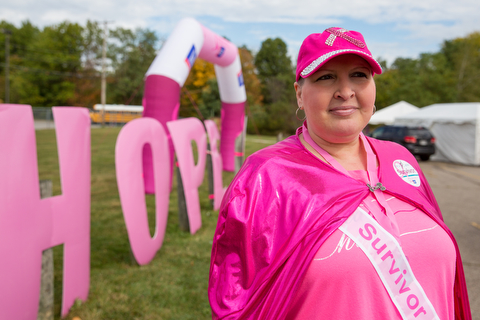 In midst of her battle with breast cancer, Debbie Fay of Hubbard, showed her strength and support for others at the Strides Against Breast Cancer walk on Saturday at Austintown High School.