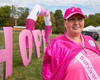 In midst of her battle with breast cancer, Debbie Fay of Hubbard, showed her strength and support for others at the Strides Against Breast Cancer walk on Saturday at Austintown High School.