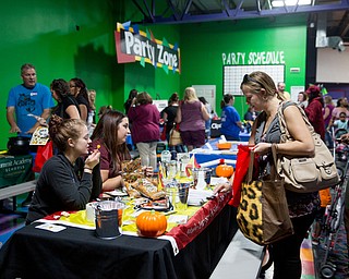 Local businesses provided various activities for the community during Skate Zone's Community Day on Saturday.