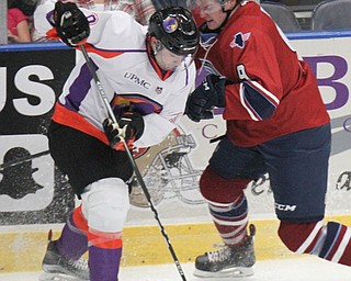 William D Lewis the Vindicator  Phantoms Tommy Parrotino(9) and ) Chicago's Davis Bunz(9) fight for the puck.