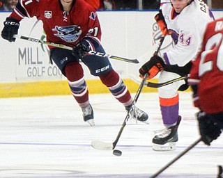 William D Lewis the Vindicator  PhantomsGianfranco Cassaro(440 moves the puck past chicago's Jamie Armstrong(21)during action 10-7-17 at Covelli.