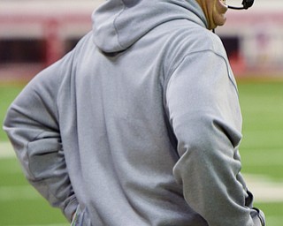 Youngstown State head coach Bo Pelini yells into his headset after a turnover on downs during the second half at the DakotaDome on Saturday, Oct. 7, 2017 in Vermillion, S.D.