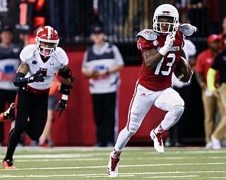 University of South Dakota wide receiver Shamar Jackson(13) runs down the field for a touchdown during the second half at the DakotaDome on Saturday, Oct. 7, 2017 in Vermillion, S.D.