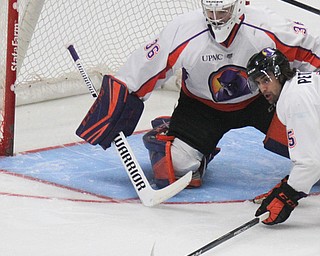 William D. Lewis The Vindicator  Phantoms goalie Wouter Peeters(36) and Andrew Petrillo(5) block a shot during 10-8-17 action a Covelli.