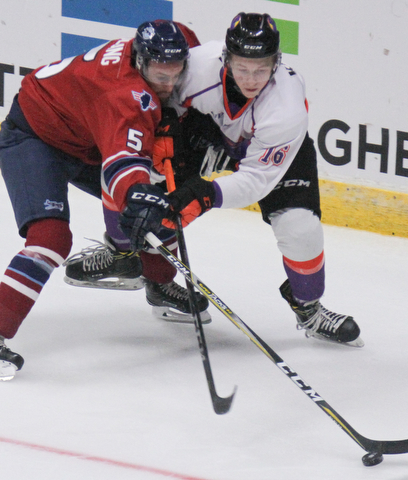 William D. Lewis The Vindicator  Phantoms Trevor Kuntar(160 and ) and Chicao's Jacob Olbing(5) battle for the puck during 10-8-17 action at Covelli.